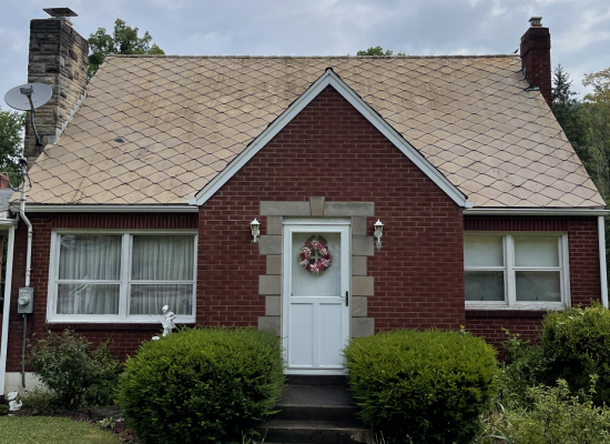 Roof cleaning (after) small house - Top Notch Pressure Washing